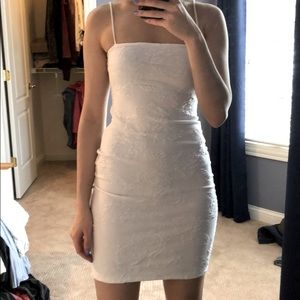 White rose-printed form fitting dress